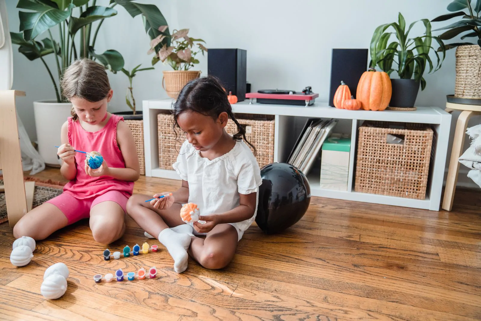 Kids painting pumpkins — easy Halloween crafts for kids